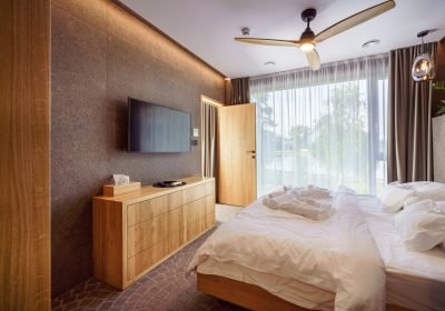 An interior of modern bedroom suite in luxury hotel